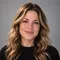 Portrait representing Sophie Bennett, AI role — Product Designer.